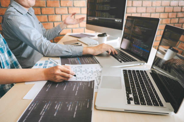 istock Team of Professional Developer programmer cooperation meeting and brainstorming and programming in website working a software and coding technology, writing codes and database 1142660294