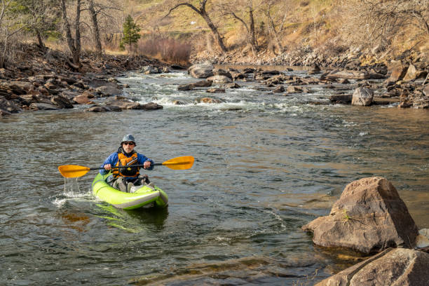 istock senior paddler in  inflatable whitewater kayak 1142662930