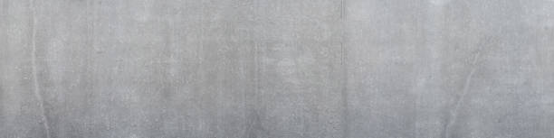istock Panorama of a gray concrete wall 1142663160