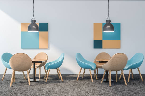 istock White restaurant interior with wooden two tables, chairs. 3d render 1142664164