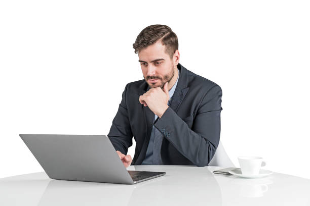 istock Serious businessman working with laptop, isolated 1142664514