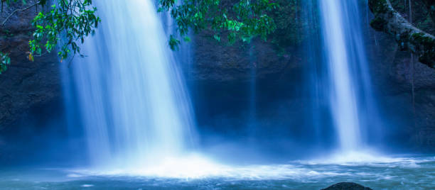 istock Picturesque tropical waterfall under the moonlight. 1142666177