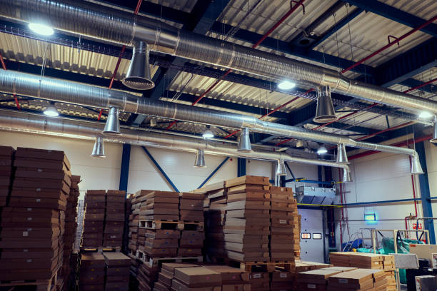 istock Warehouse with modern ventilation system full of raw material. 1142666457