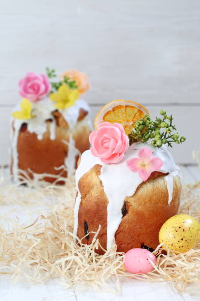 istock Easter cakes on white wooden background 1142670291