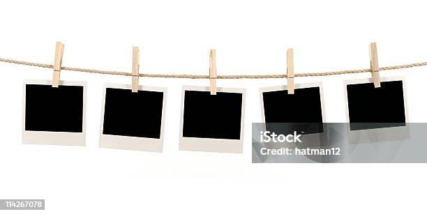 Blank Polaroid Pictures Hanging On A Clothes Line Stock Photo - Download Image Now - Instant Print Transfer, Instant Camera, Photograph