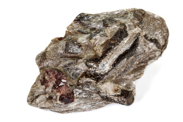 istock Macro stone Garnet mineral in rock on a white background 1142671394