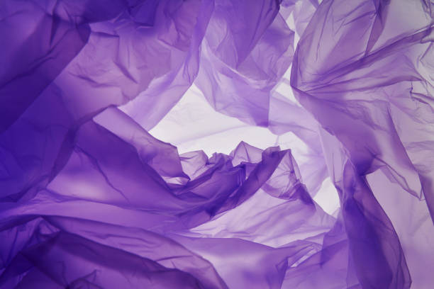 istock Plastic bag. Dark violet stain background. Abstract blob for text and design. 1142671975