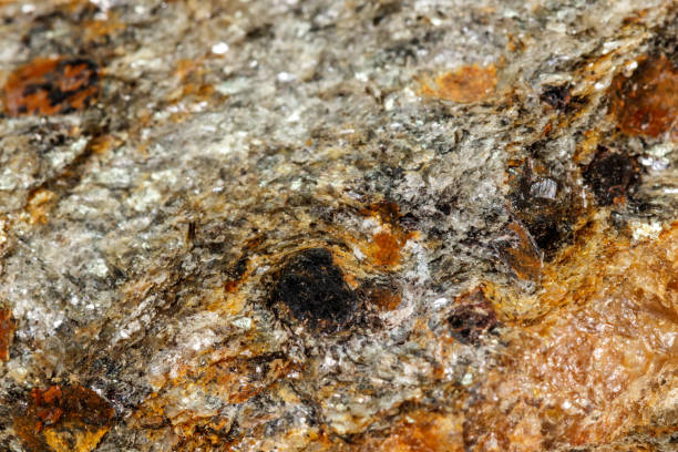 istock Macro stone Garnet mineral in rock on a white background 1142674209