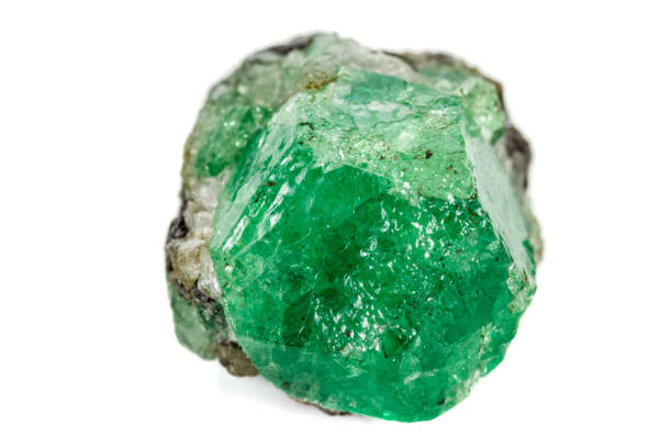 istock Macro stone garnet mineral, Uvarovite in rock on a white background 1142674379