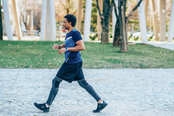 istock Sporty young man running outdoor 1142674852