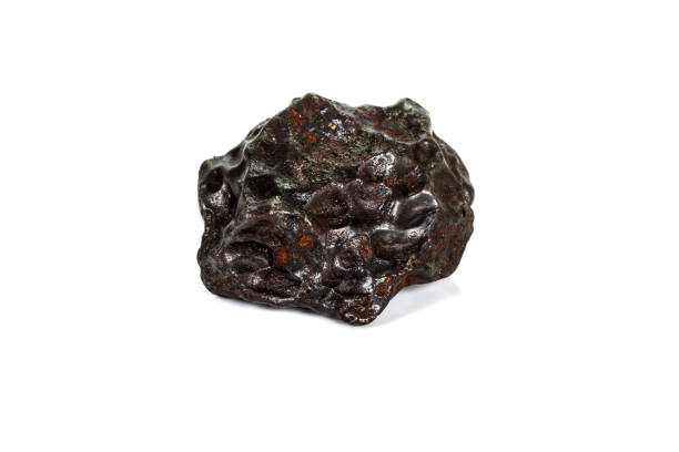 istock Macro stone mineral meteorite tektite on white background 1142674870