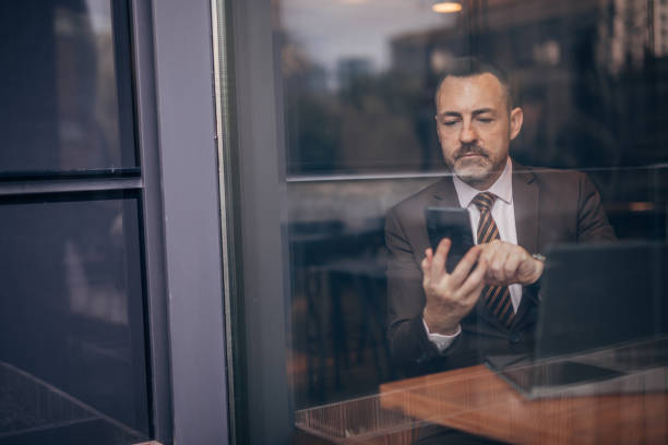 istock Senior businessman having a video call 1142676308