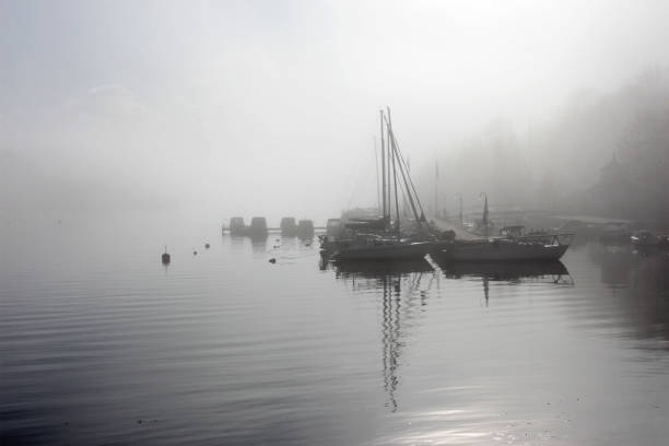 istock berth for yachts and boats in thick fog 1142677850