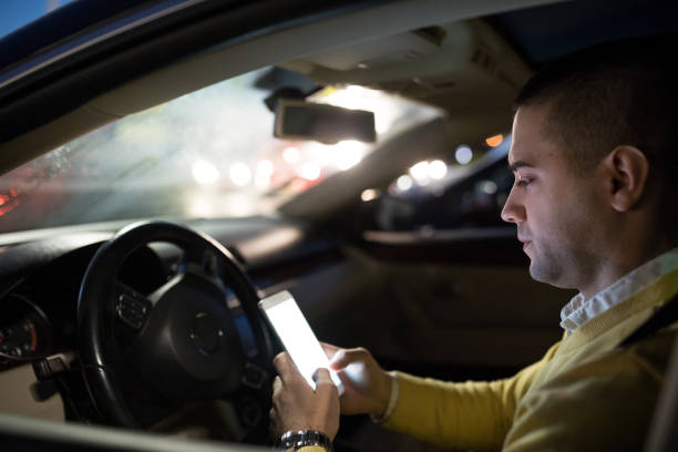 istock Driving and talking on the phone 1142678240