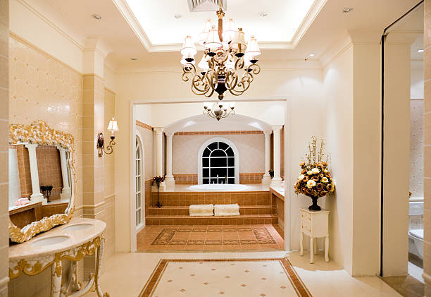 istock Luxury master bathroom including a hanging chandelier 114268184