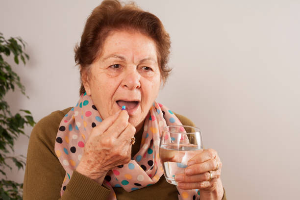 istock old woman have aches 1142684782