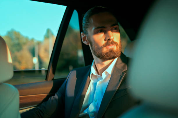 istock Young Businessman in a limo 1142687170