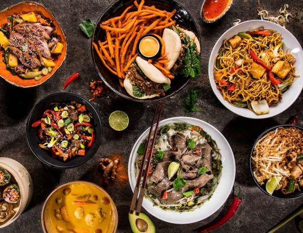 istock Asian food background with various ingredients on rustic stone background , top view. 1142689850