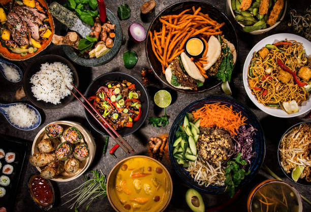 istock Asian food background with various ingredients on rustic stone background , top view. 1142689881