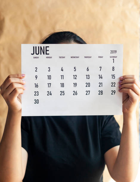 istock A woman holding simple June 2019 calendar 1142693004