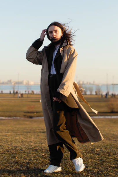 istock Charming girl posing for the camera outdoors. 1142704073