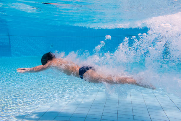 istock Boy dive in swimming pool 1142704282