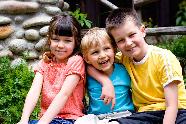 istock happy sister with brothers 114270477