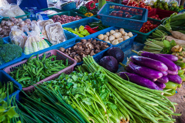 istock Thai Asian grocery bazaar with fresh vegetables 1142705955
