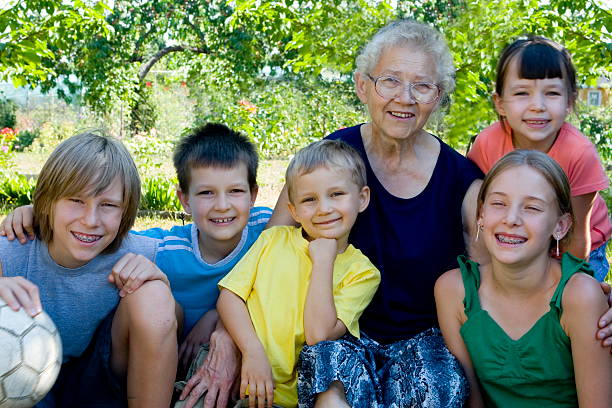 Kissing Great Grandma 80 years grandson retirement senior 