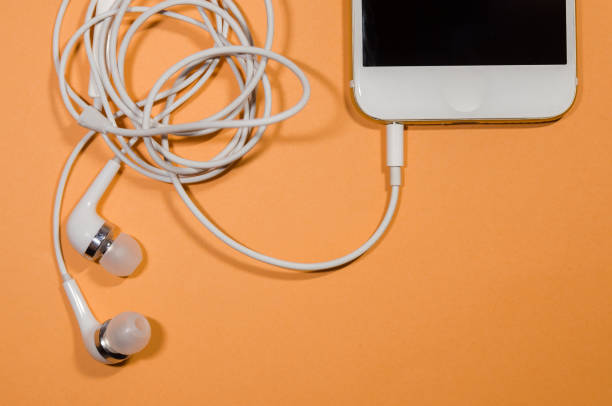 istock a phone with usb cable and headphones 1142706735