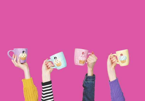 istock Many different arms raised up holding coffee cup 1142711934