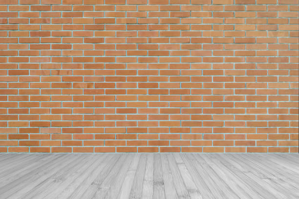 istock Dark orange brown brick wall texture background with wooden floor in grey 1142713965