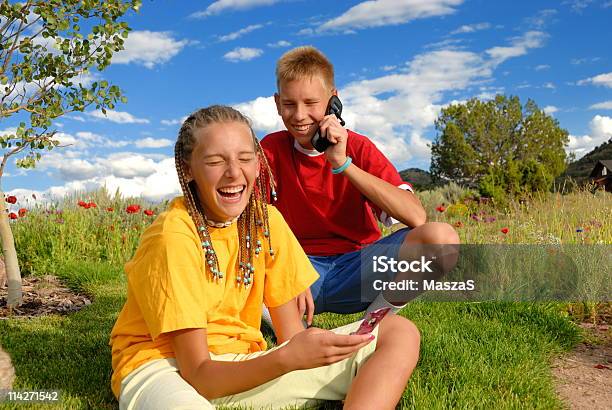 Children On Cell Phones Stock Photo - Download Image Now - Adolescence, Cheerful, Child