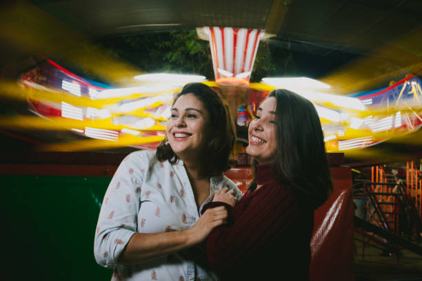 istock Same-sex love at the amusement park 1142717866