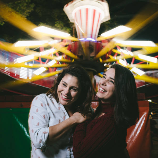 istock Same-sex love at the amusement park 1142717878