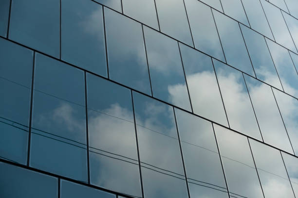 istock glass building reflection of sky 1142717917