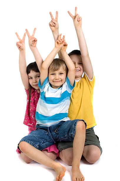 istock Happy Children Giving Victory 114271863