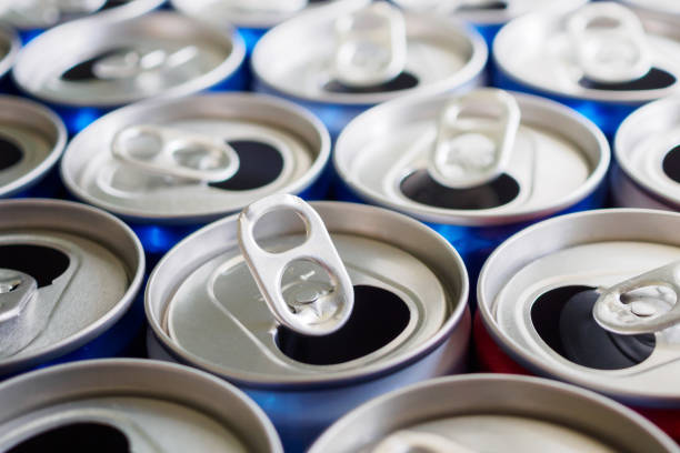 istock Empty aluminium drink cans recycling background concept 1142719392