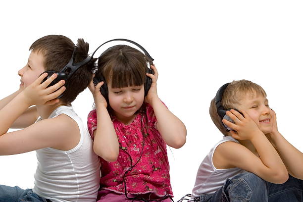 istock Three Children Listen to Music 114272630