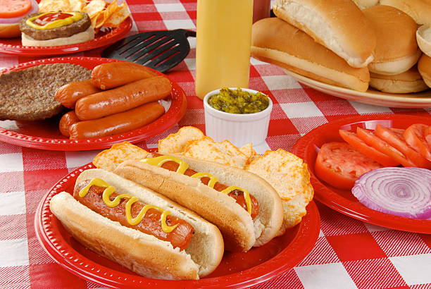istock Summer picnic table full of food 114272648