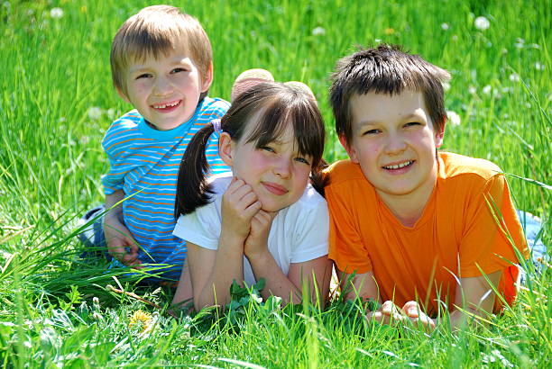 istock Children In The Grass 114272796
