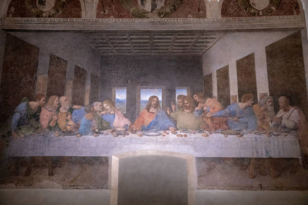 Picture The Last Supper by Leonardo da Vinci Milan, Italy - June 27, 2018: Interior of refectory of the convent Santa Maria delle grazie (Holy Mary of Grace), on wall mural of The Last Supper by Leonardo da Vinci medieval fresco stock pictures, royalty-free photos & images