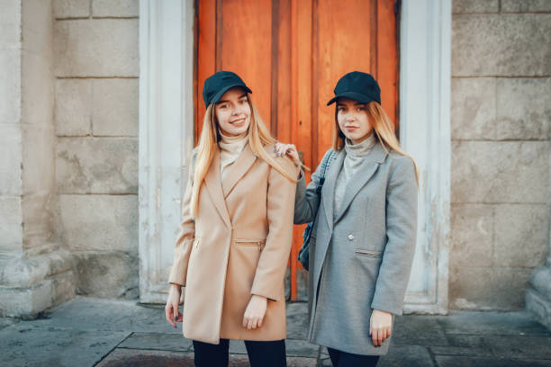 istock Two beautiful girls near building 1142731468