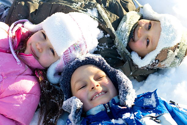 istock Happy Kids Playing in Fresh Snow 114273151
