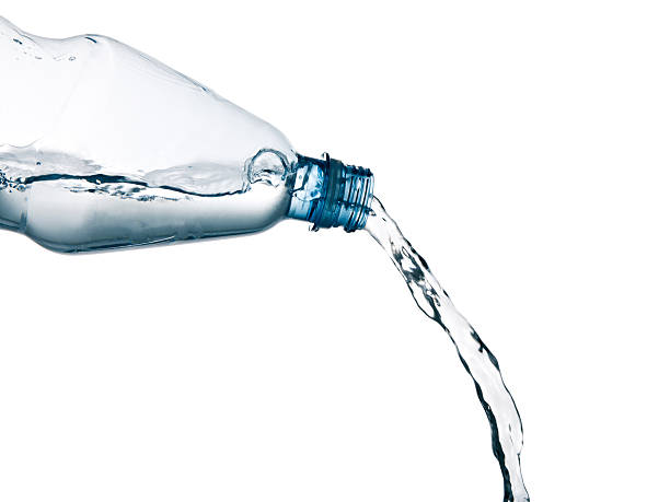 istock pouring mineral water from a bottle 114273805