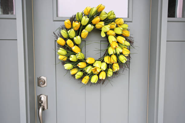 istock Beautiful Front Door Spring Tulip Wreath Close Up 1142738817