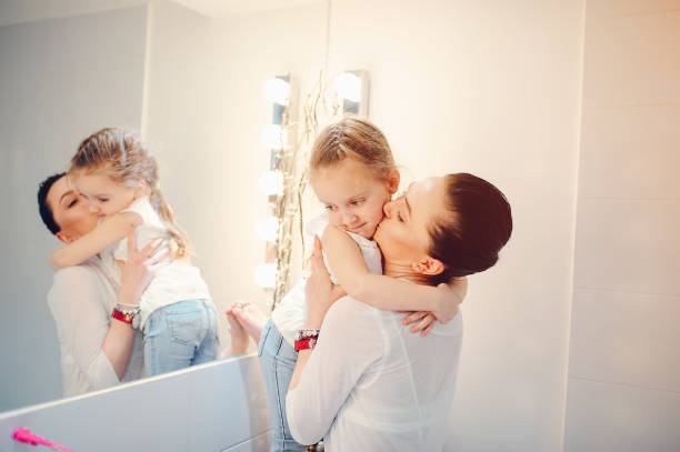 istock Cute family have fun in a bathroom 1142742296