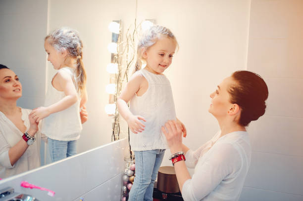 istock Cute family have fun in a bathroom 1142742318