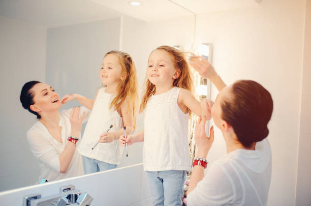 istock Cute family have fun in a bathroom 1142742434
