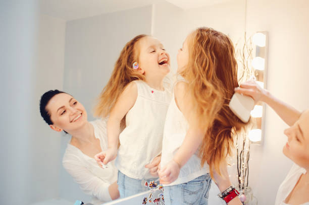 istock Cute family have fun in a bathroom 1142742460
